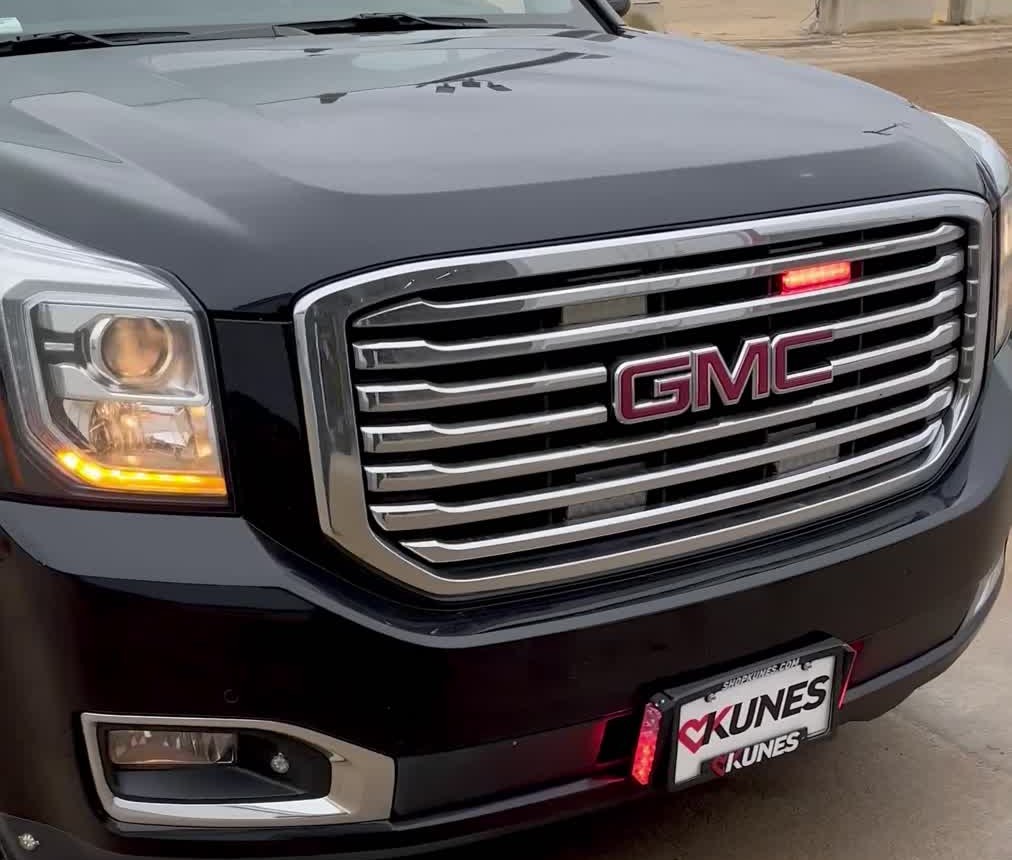 Close-up of grille hideaway strobes on a GMC Yukon