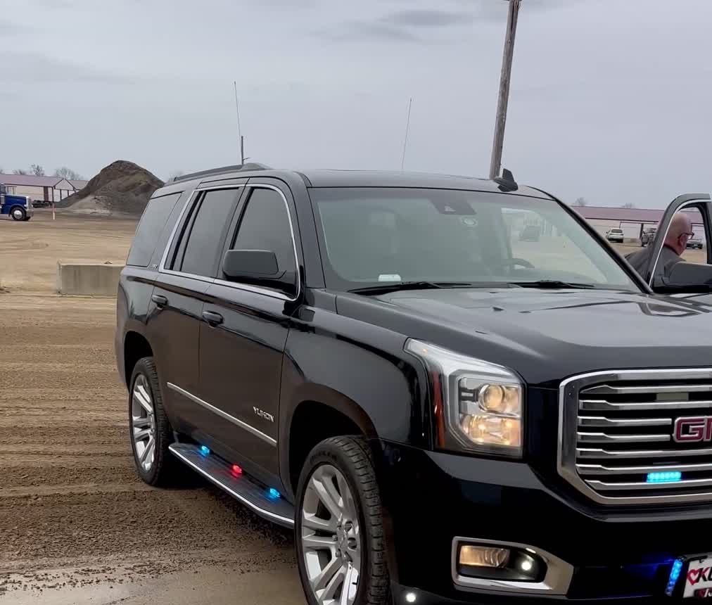 Running-board emergency lighting on a GMC Yukon
